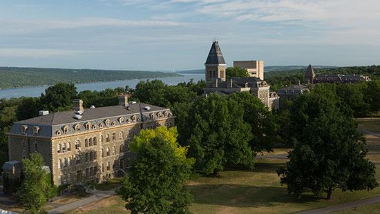 aerial view of a college campus overlooking a lake