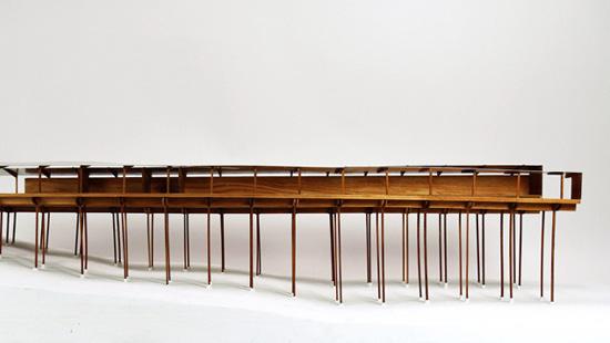 Horizontal wood model on stilts. 