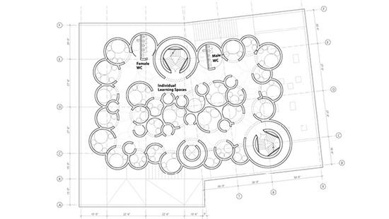 Architectural draft of floor plan with multiple rounded walls. 