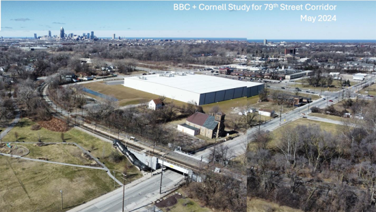 aerial view of neighborhood including buildings, trees, and streets