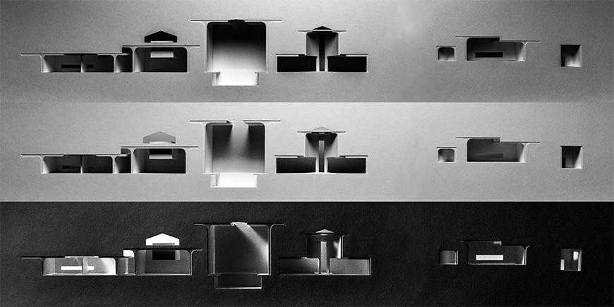 Three photographs of light-study models made out of white chipboard and paper materials showing section-cuts through proposal, each