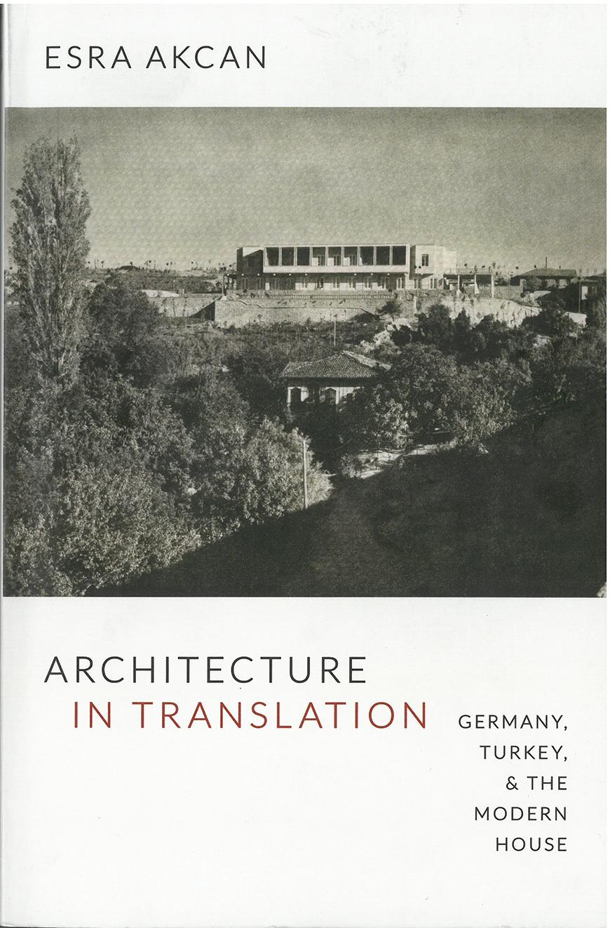book cover with text and a black and white photo of a modern building adjacent to an older building set among trees